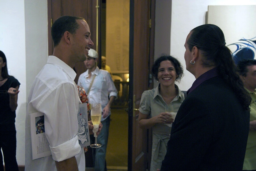 Photo of Guests at Ballajá Barracks at Museo de las Américas in Old San Juan, Puerto Rico at the artist and painter Michael J. Korber's Art Retrospective Exhibit reception, titled A decade of line and color, in 2007.