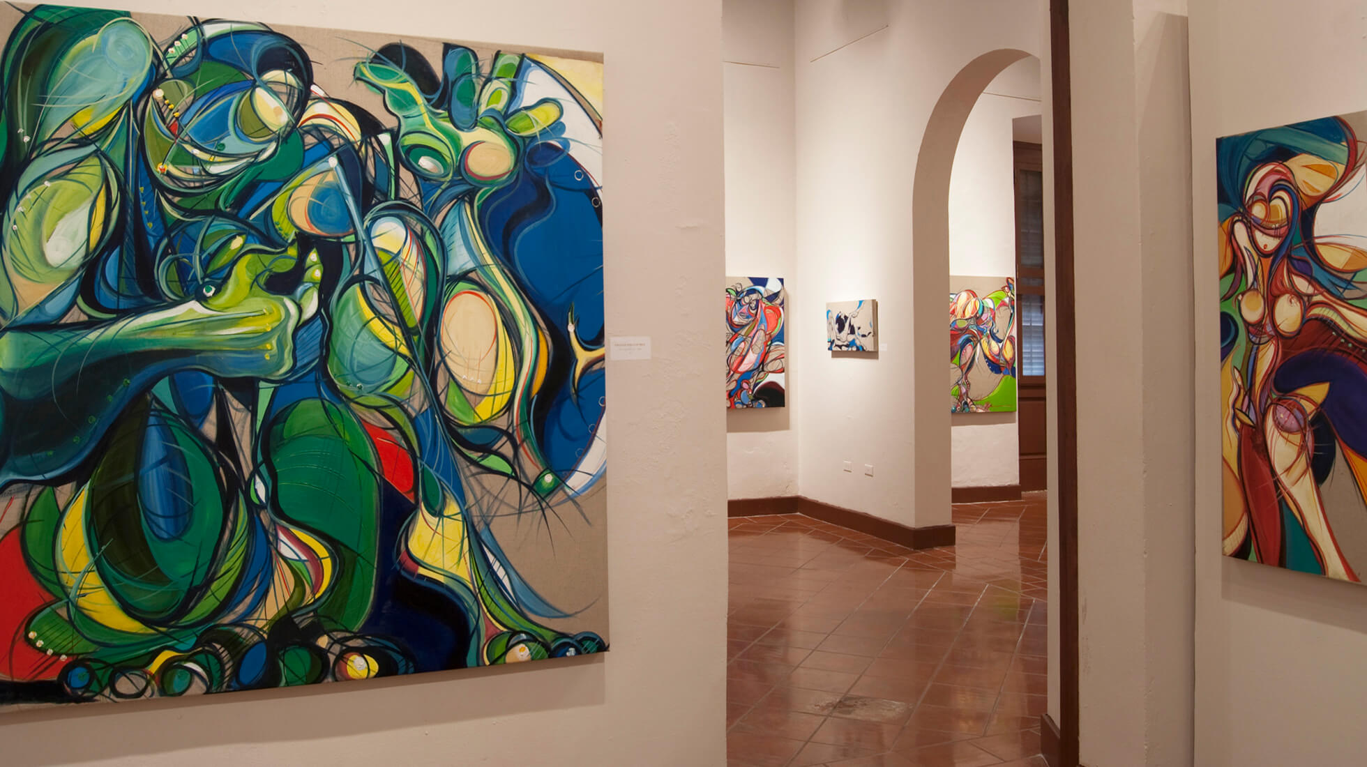 Photo of the Salon B of artist and painter Michael J. Korber at his Art Retrospective at the Museo de las Américas in Old San Juan, Puerto Rico, titled - A decade of line and color, in 2007.