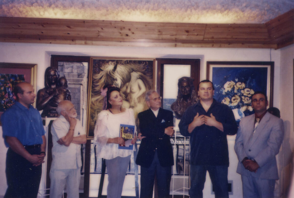 Photo of Korber with Dame Françoise Tempra, Mgarr councillor Michael Farrugia, Artist Anton AguisByron Veras and Mgarr councillor Frans Chircop at the Salon Section of the 2003 Malta International Art Biennale - mjk003.jpg